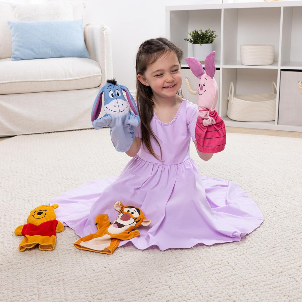 Melissa & Doug Titeres de mano suaves y tiernas de Winnie The Pooh de Disney