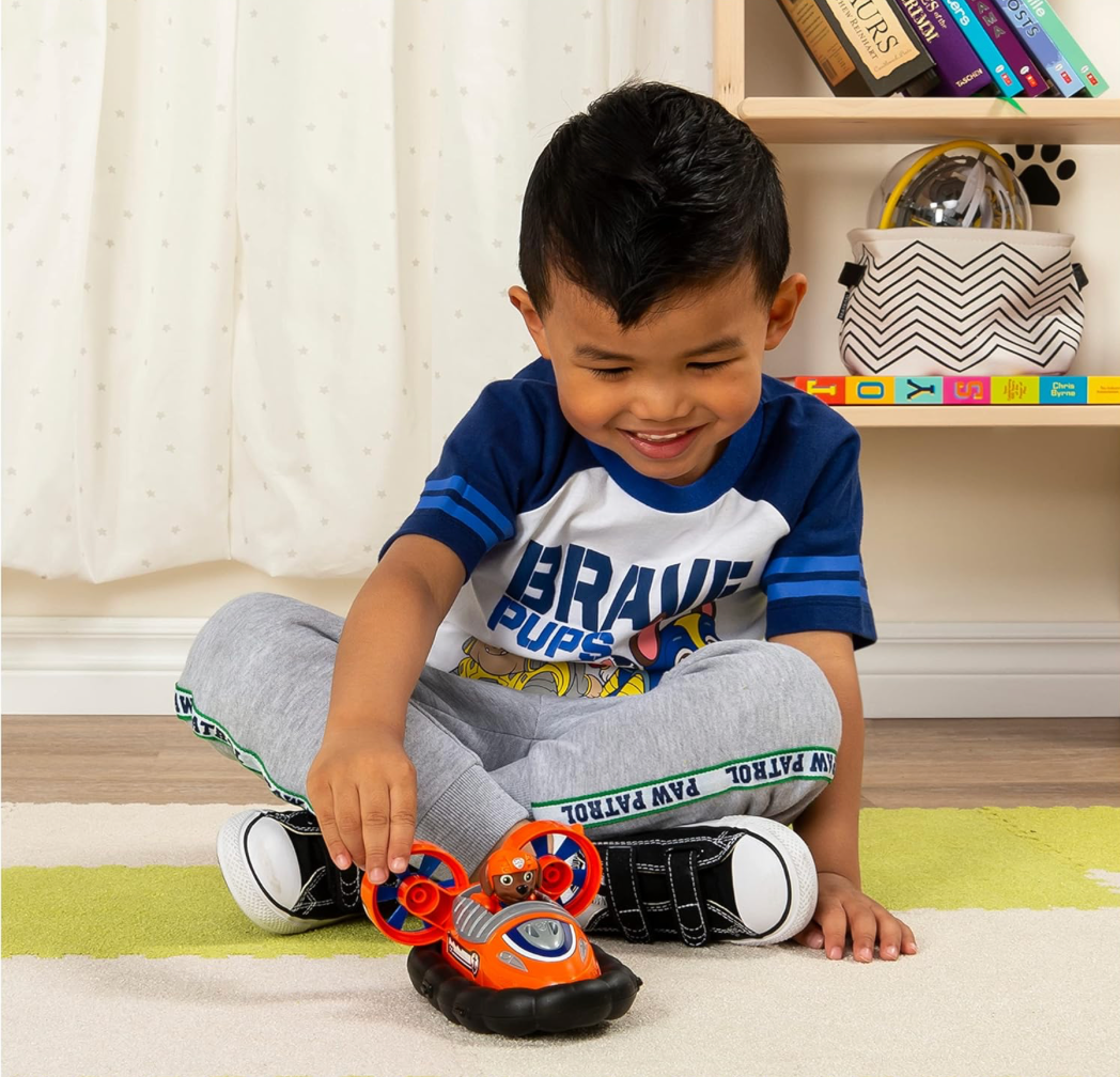 PAW PATROL - Vehículo aerodeslizador de Zuma con figura coleccionable, para niños a partir de 3 años